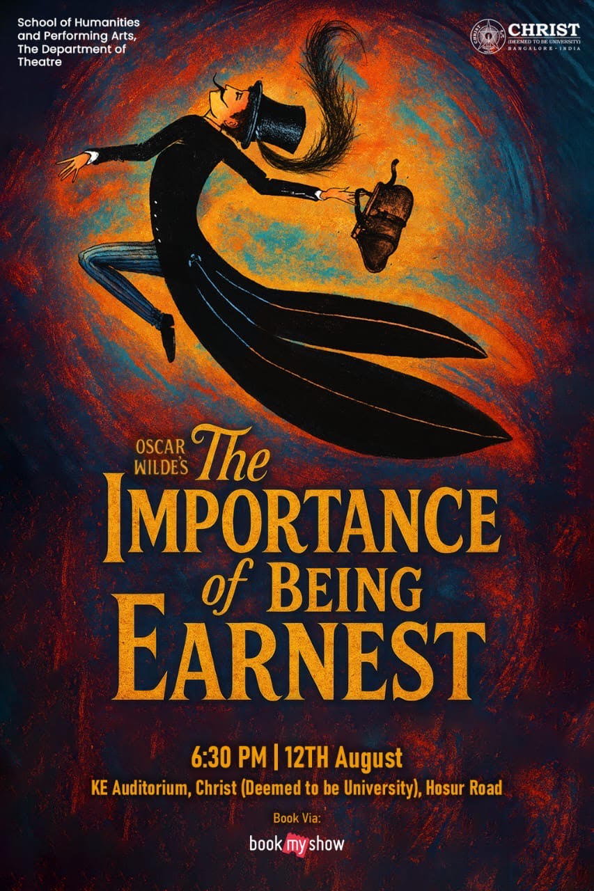 The Importance of Being Earnest — cast in high Victorian dress, elaborate set with floral arrangements and period furniture